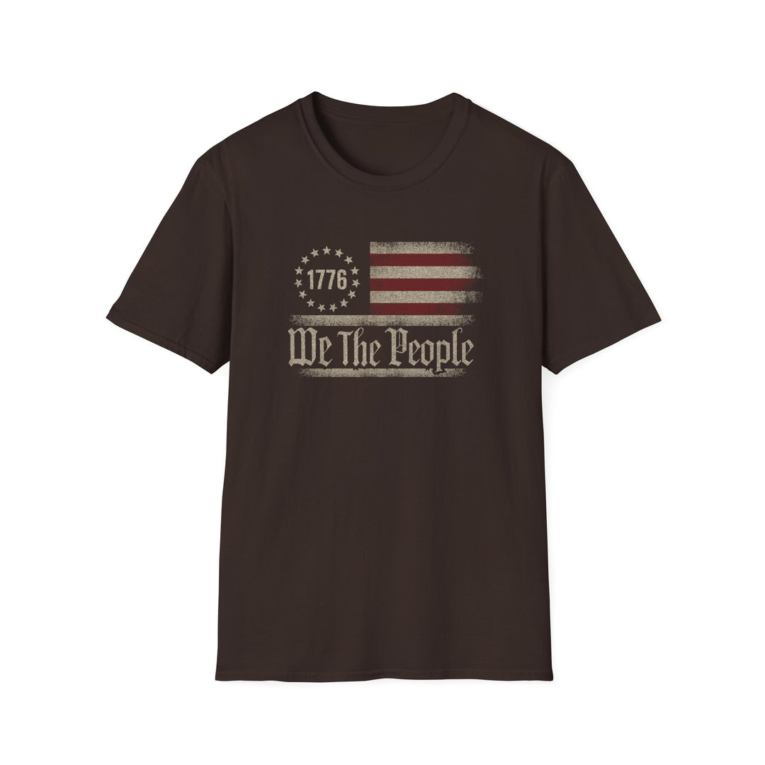 Dark chocolate unisex t-shirt with a distressed vintage Betsy Ross flag and old-style blackletter text reading We The People with 1776 in the star circle