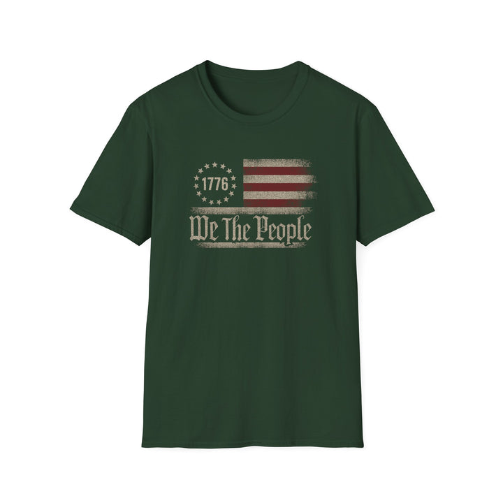 Forest green unisex t-shirt with a distressed vintage Betsy Ross flag and old-style blackletter text reading We The People with 1776 in the star circle