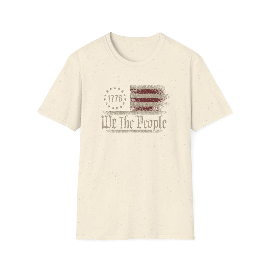 Natural unisex t-shirt with a distressed vintage Betsy Ross flag and old-style blackletter text reading We The People with 1776 in the star circle