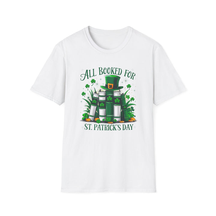 White unisex t-shirt with an illustrated stack of green books topped with a leprechaun hat surrounded by shamrocks and the text All Booked for St. Patrick&
