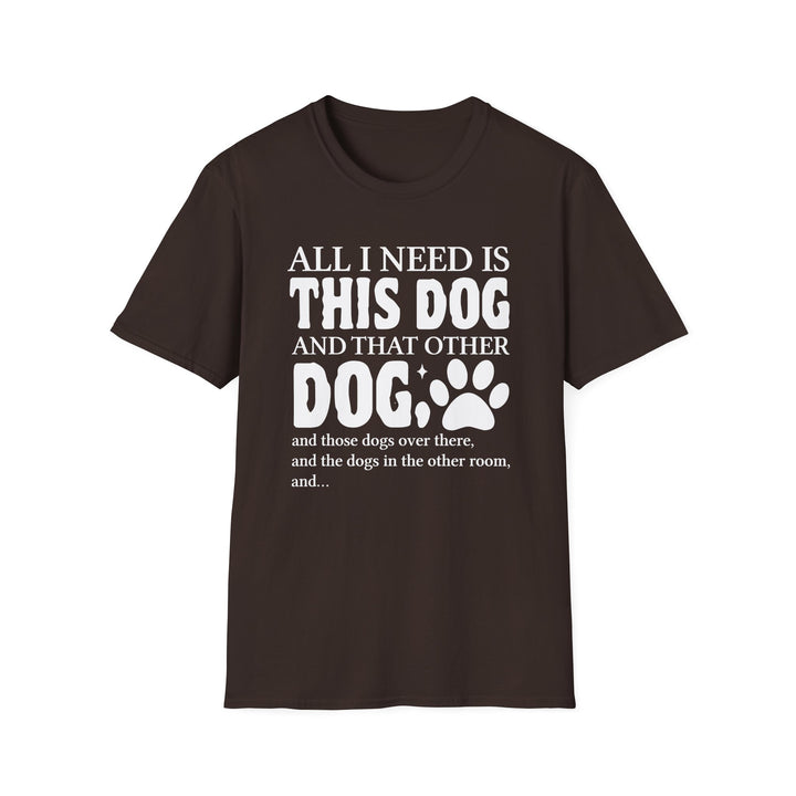 Dark chocolate unisex t-shirt with bold bubble text reading All I Need Is This Dog and That Other Dog with a paw print accent
