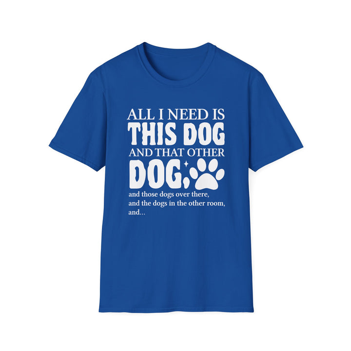 Royal blue unisex t-shirt with bold bubble text reading All I Need Is This Dog and That Other Dog with a paw print accent