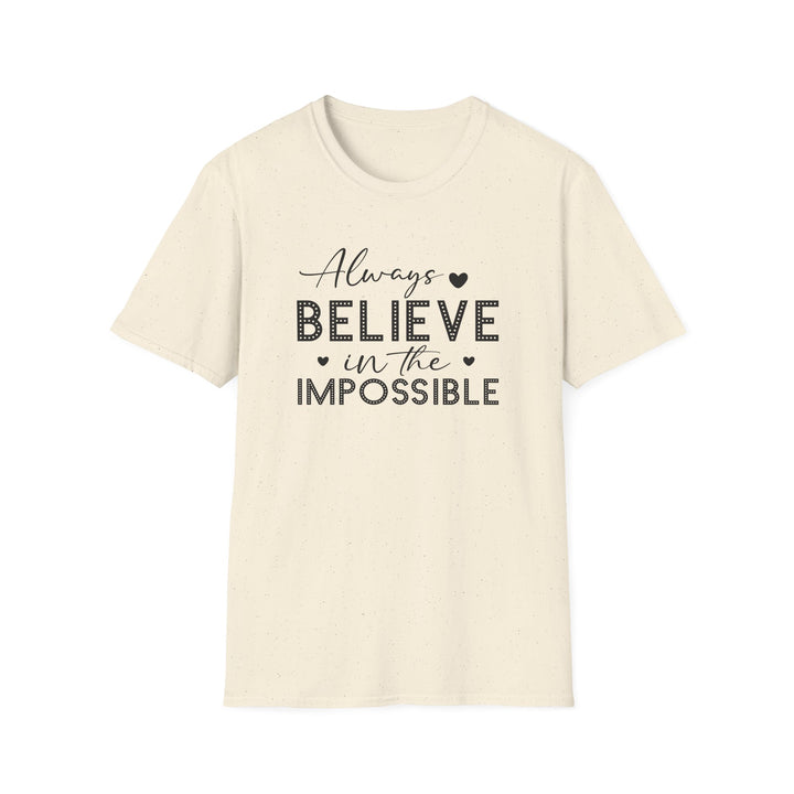Natural unisex t-shirt with script and dotted block lettering reading Always Believe in the Impossible with small heart accents