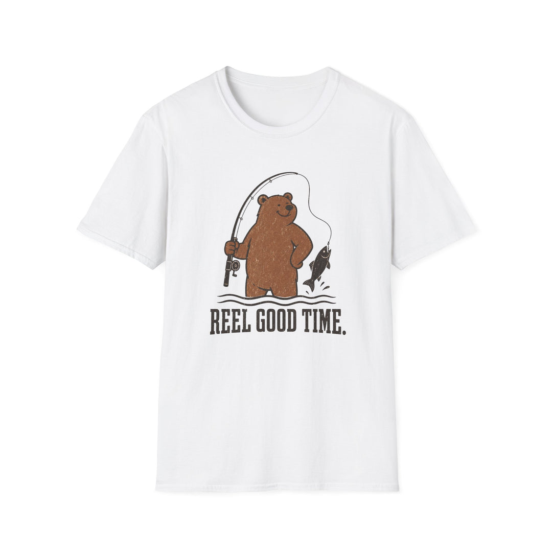 White t-shirt featuring a brown bear standing in water holding a fishing rod with a caught fish and text reading reel good time